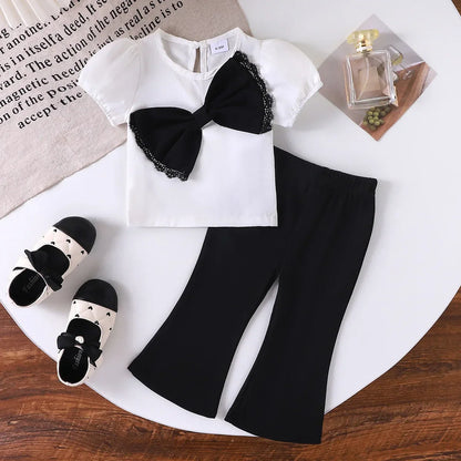 Europe  United States summer girl suit new temperament girl suit  child bubble sleeve short sleeve + micro pants two-piece set