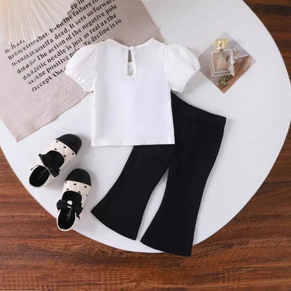 Europe  United States summer girl suit new temperament girl suit  child bubble sleeve short sleeve + micro pants two-piece set