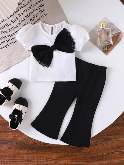 Europe  United States summer girl suit new temperament girl suit  child bubble sleeve short sleeve + micro pants two-piece set